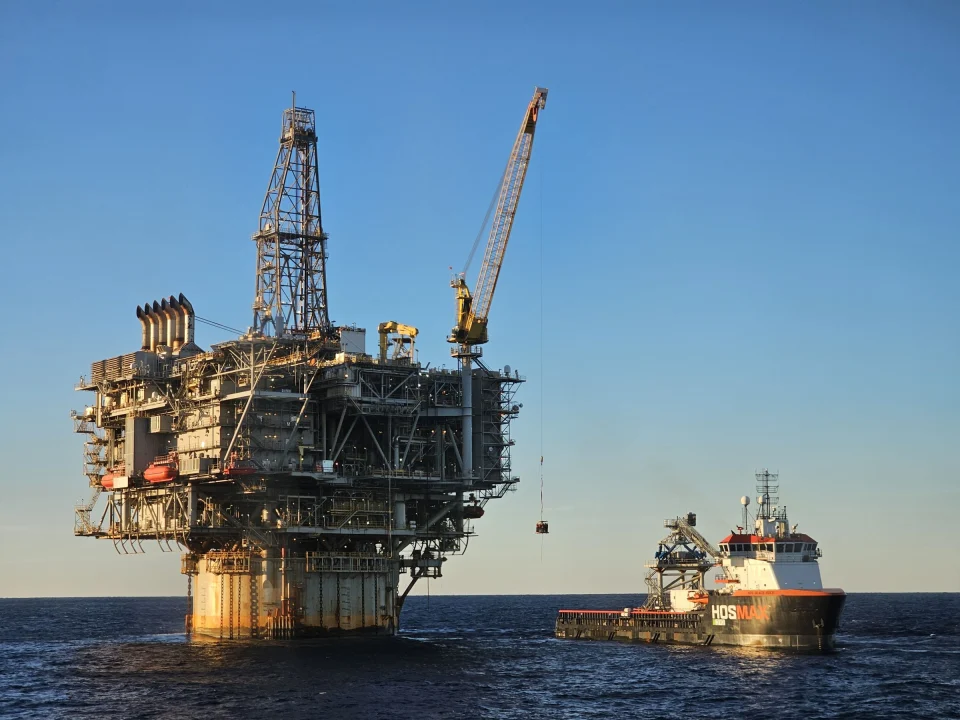 Offshore platform with a supply vessel alongside